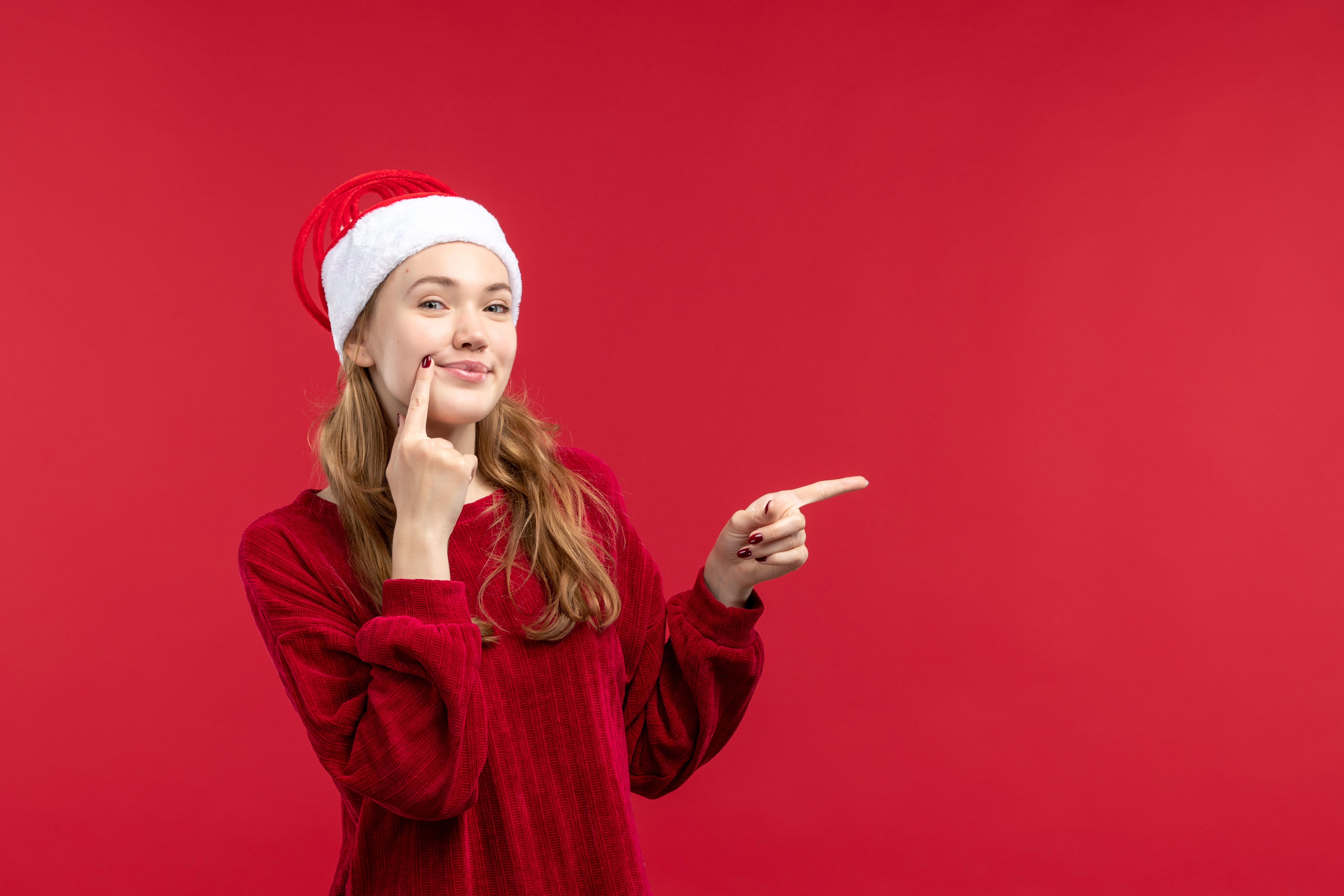 front-view-young-woman-with-delighted-expression-christmas-holiday-red